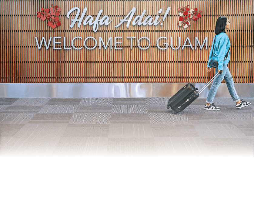 Woman walking while pulling her suitcase